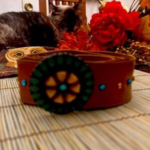 Leather belt with stones/metal buckle.